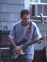 doganwithguitarinct.jpg