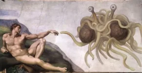 Uçan_Spagetti_Canavarı_Ve_Adem.webp