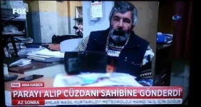 parayı-alıp-cüzdanı-sahibine-gönderen-adam_546414.webp