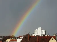 rainbow_weather_phenomenon_sky_rain_city_homes_rainbow_colors_spre-1126120.webp